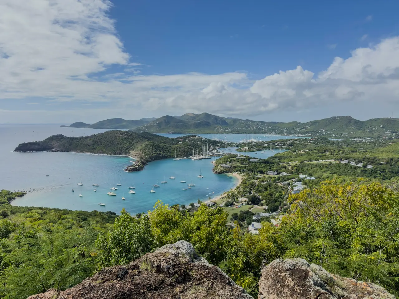 Yachts moored in Antigua's English Harbour seen from the hillside above