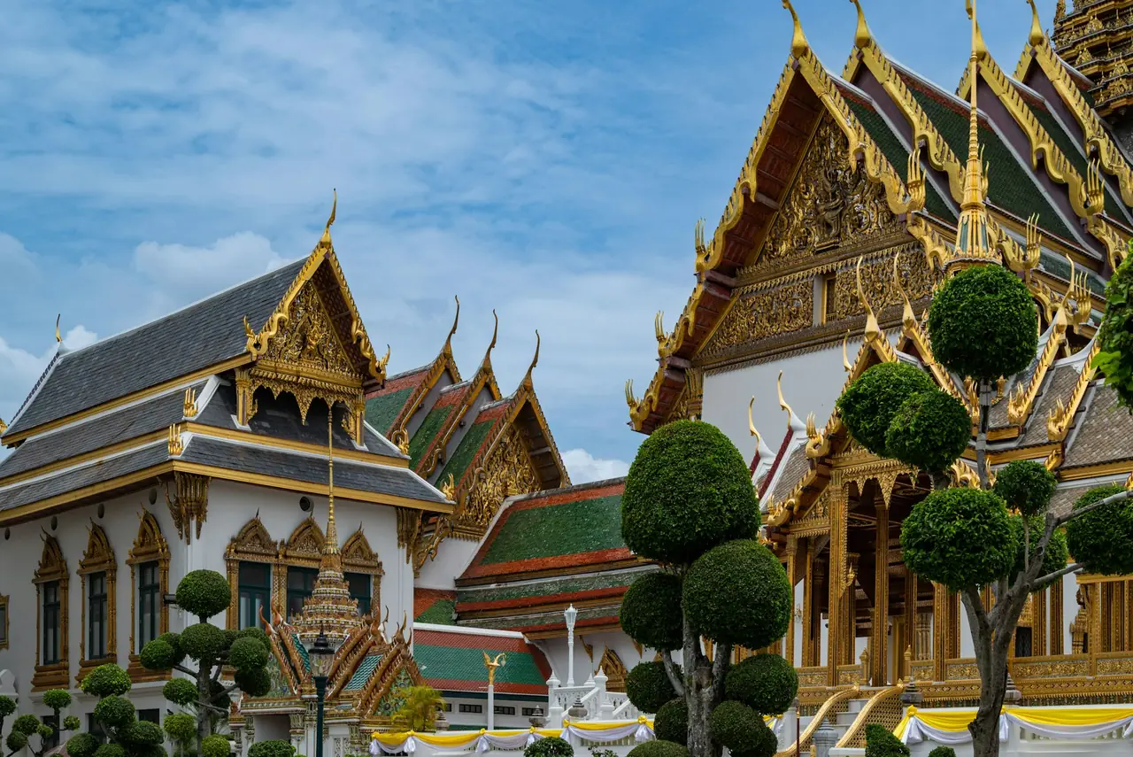 Gilded rooftops and spires inside the Grand Palace complex in Bangkok