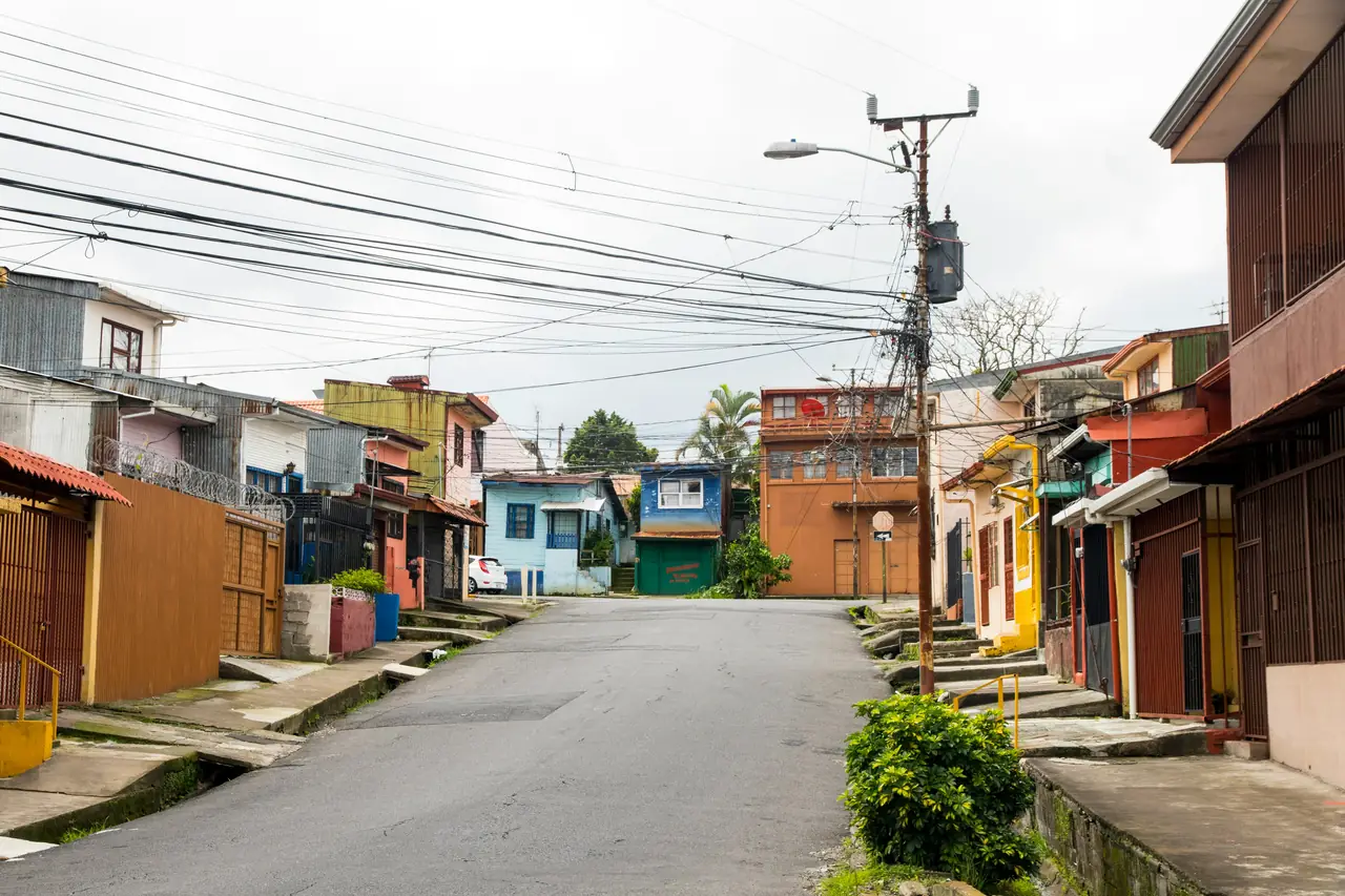 A quiet residential street of painted wooden houses in Bocas town